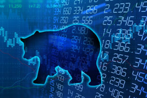 silhouette form of bear on financial stock market graph represent stock market crash or down trend investment